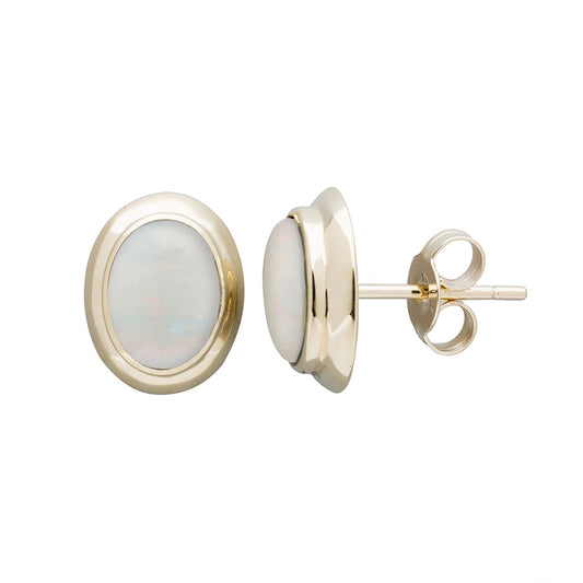 Ivory Oval Solid Opal Stud Earrings 9 kt Yellow Gold